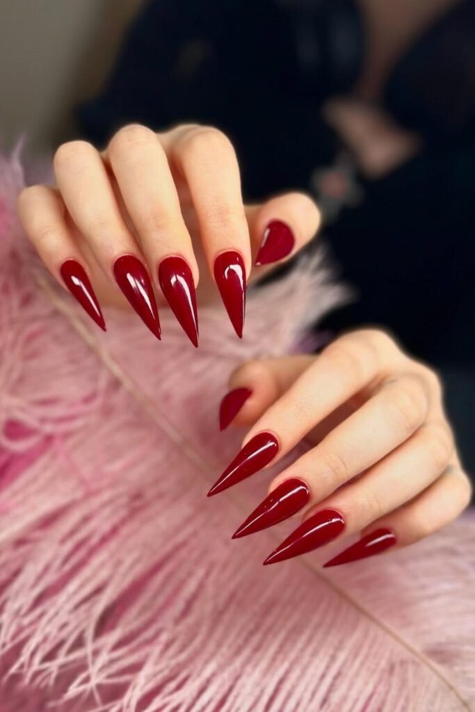 devil's red stiletto nails