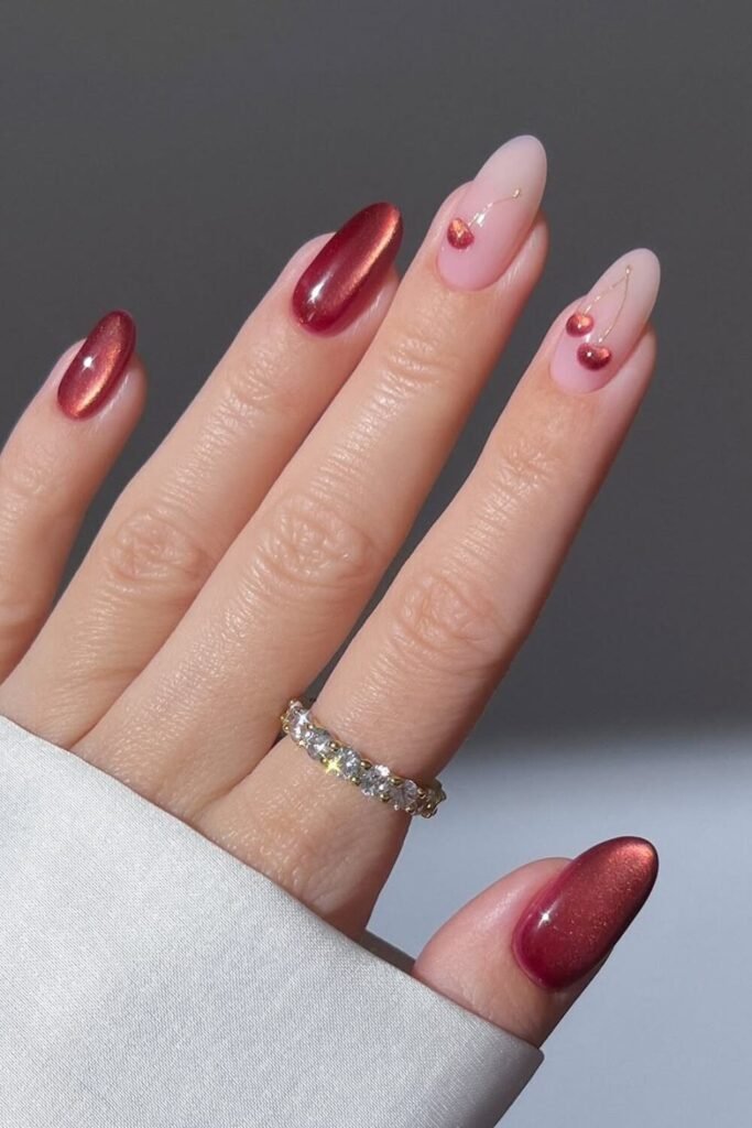If you love jelly nails, you’ll be obsessed with cherry glass nails! This look features a sheer, glossy red ombre finish that mimics the effect of stained glass or translucent jelly polish. Add tiny cherry decals or glitter accents for a super trendy, Pinterest-worthy manicure.