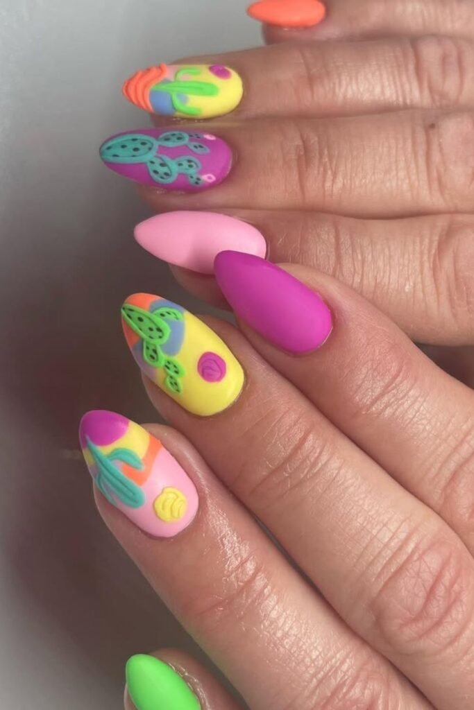 Get ready for a cactus party with this colorful summer nail art! Featuring bold hot pink, fiery orange, bright yellow, and deep purple shades, these festive nails are perfect for summer vibes and Festive celebrations.