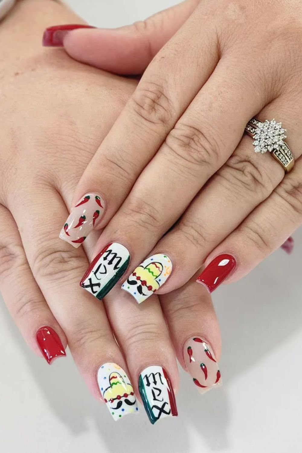 Oh wow, this is a total masterpiece! The nails are bursting with bold, vibrant patterns that capture the energy of the celebration. The intricate details give it an almost embroidered effect, reminiscent of tradition inspired by folk art.
