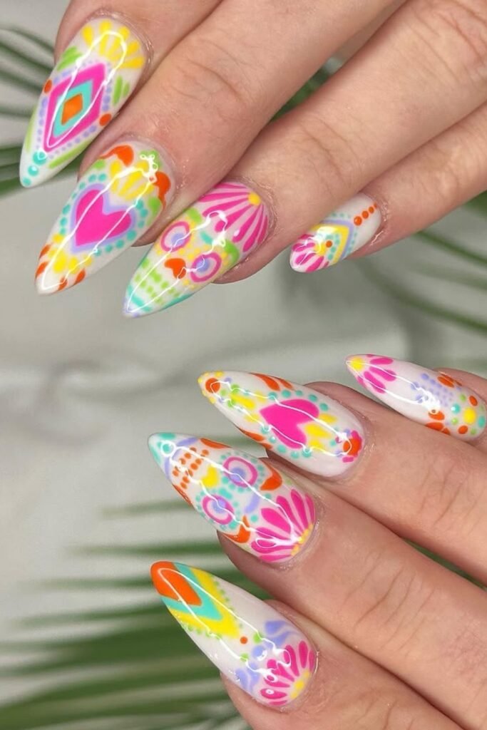 These Colorful Spring Day of the Dead nails combine bold, festive designs with Bright, dramatic elegance. Perfect for anyone who loves Mexican-style nail art with a gothic and celebratory twist.