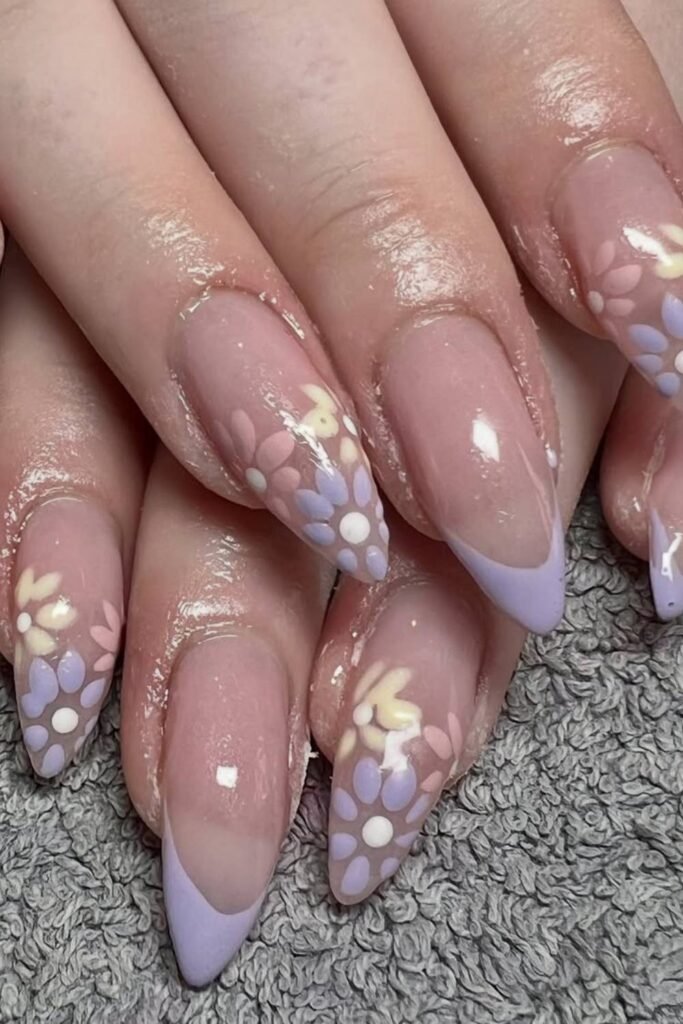 Soft lilac tips + tiny floral art = spring goddess energy.