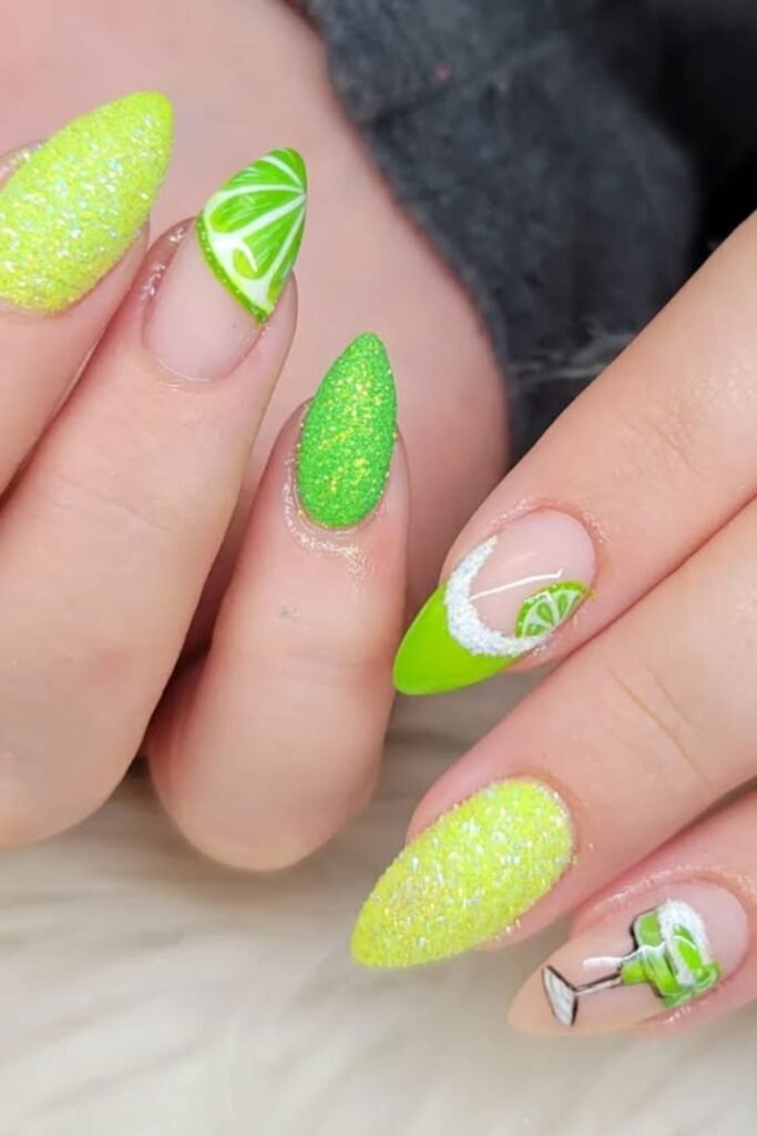Bring your spring nails to life with this lime and glitter nail art! Featuring sparkling green nails, detailed lime slice designs, and cute margarita glass accents, this fresh and festive look is perfect for Cinco de Mayo and spring parties.