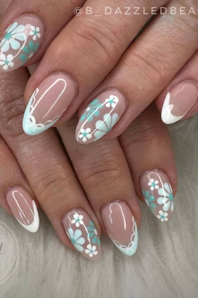 French tips, but make them spring-core: pastel flowers, dainty bows, and total soft-girl vibes.