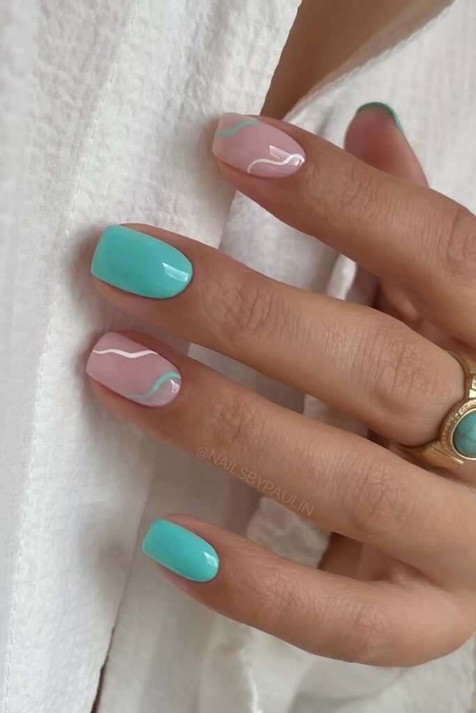 A super clean teal color and swirls on short, squared-off nails = effortless springtime flex.