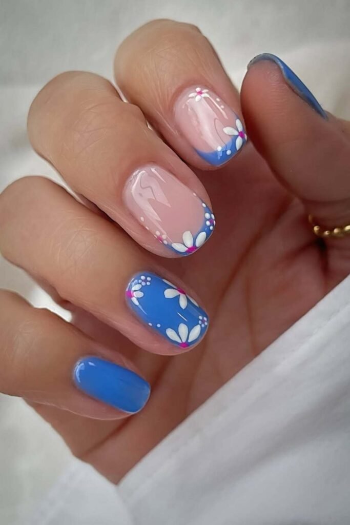 Blue and pink floral summer nails on short nails.