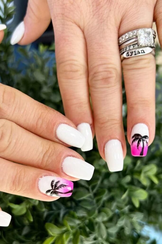 Cool-toned nails with palm designs.