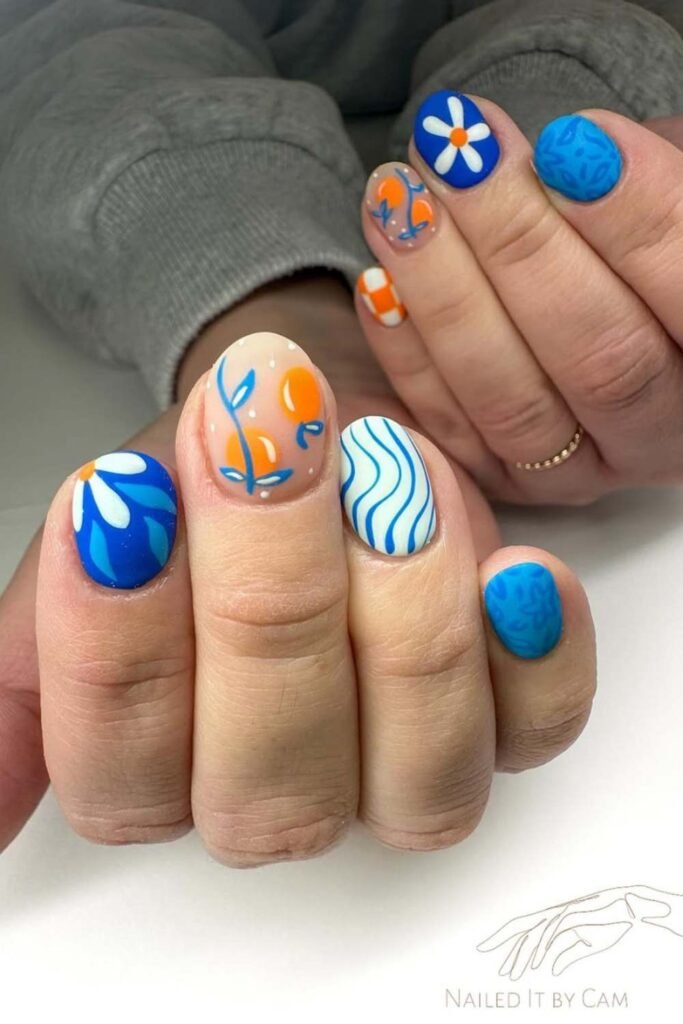 Ocean-themed neon short summer nails.