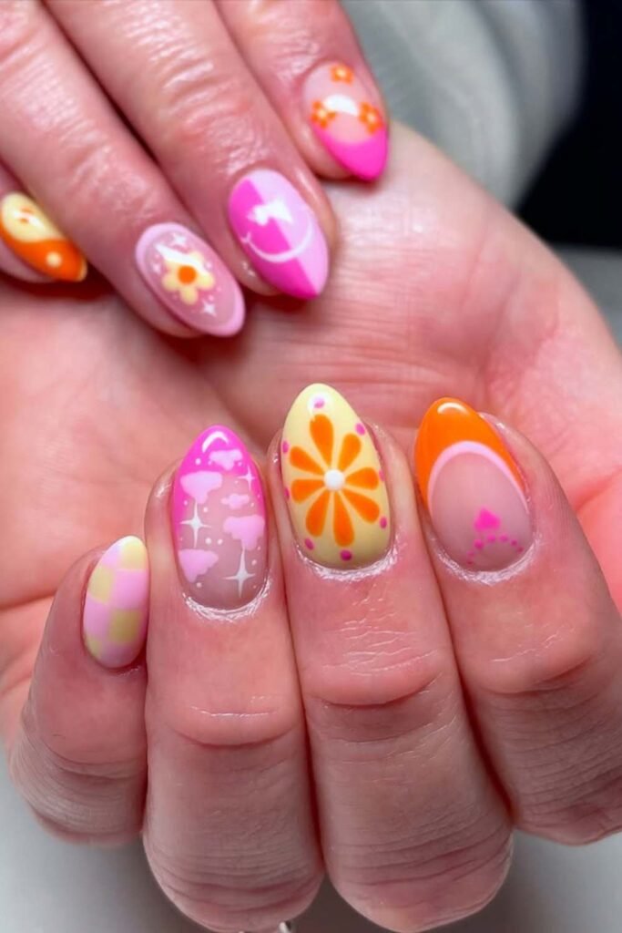 Peach, pink, and yellow bright summer short nails.